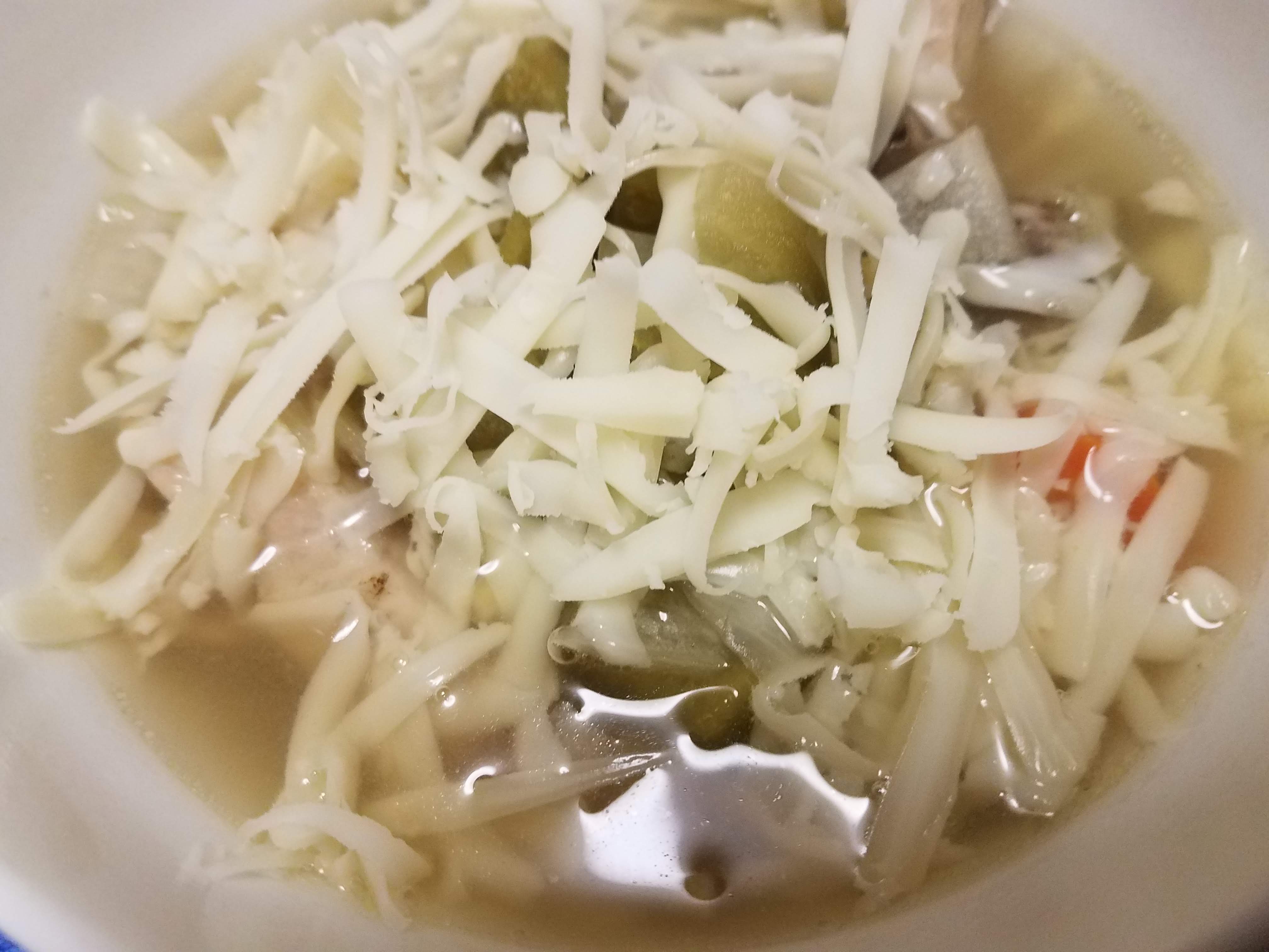 Chicken Soup Served with Mozzarella Cheese