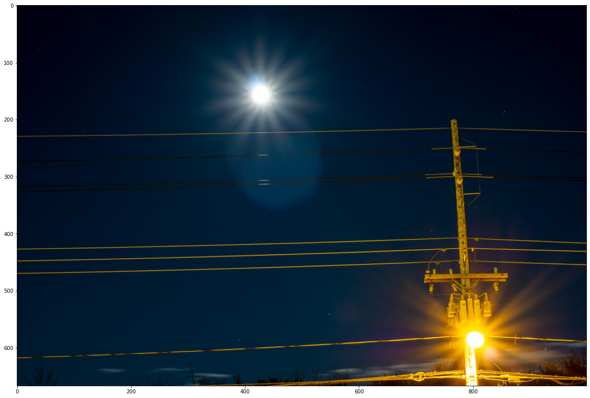 image of moon and street light